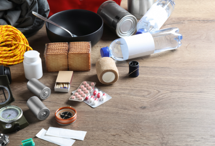 emergency supply kit on a wooden table