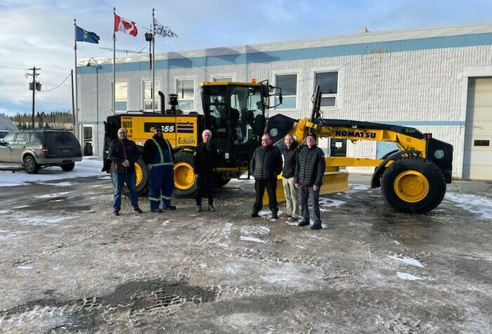 Council and Staff in front of Grader
