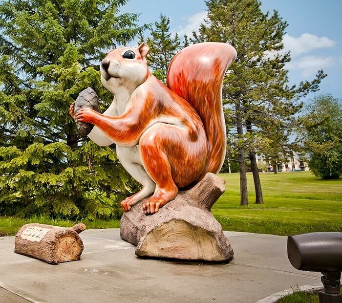 Statue of Red Squirrel Holding acorn